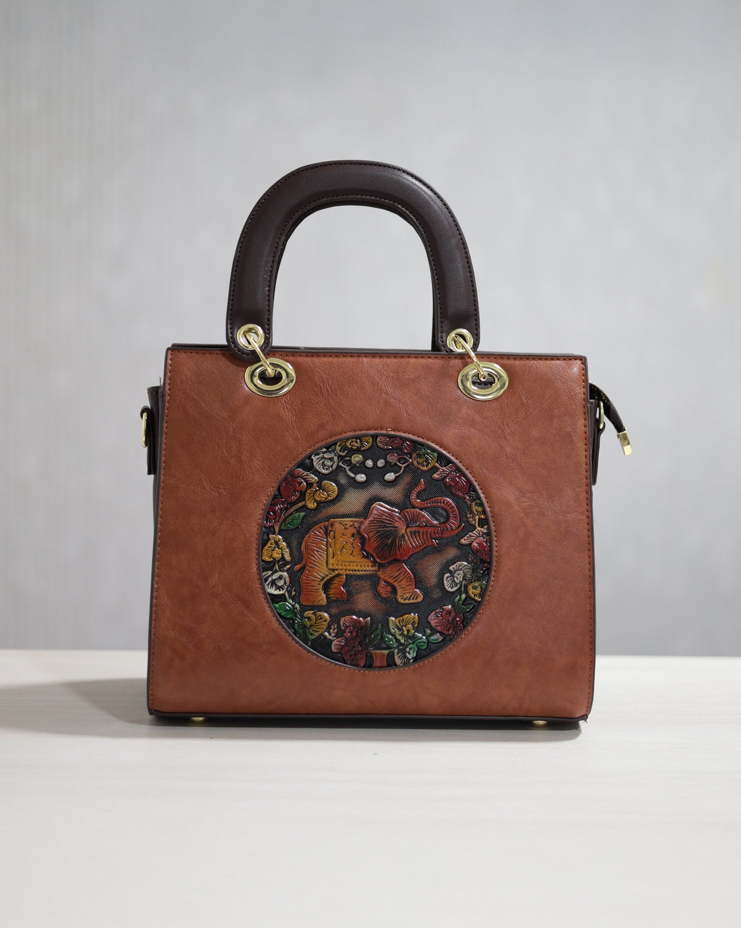 Majestic Elephant Embossed Sling Bag